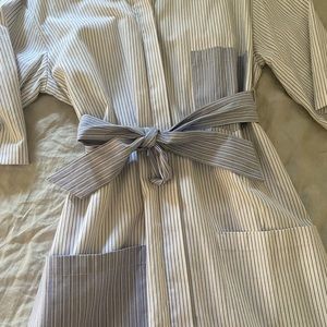 in pristine condition a never worn shirt dress